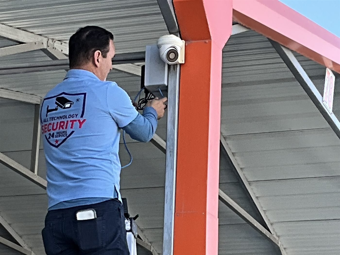All Technology Security technician installing security camera Sarasota FL